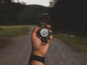 Preview wallpaper compass, hand, nature, travel