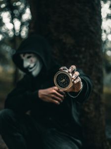 Preview wallpaper compass, man, mask, anonymous, hood