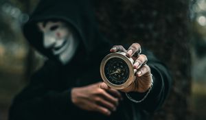 Preview wallpaper compass, man, mask, anonymous, hood