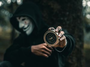 Preview wallpaper compass, man, mask, anonymous, hood