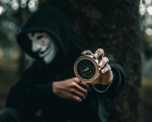 Preview wallpaper compass, man, mask, anonymous, hood