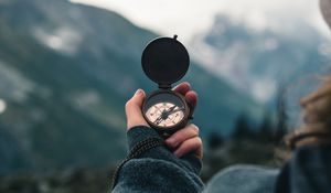 Preview wallpaper compass, travel, hand, focus