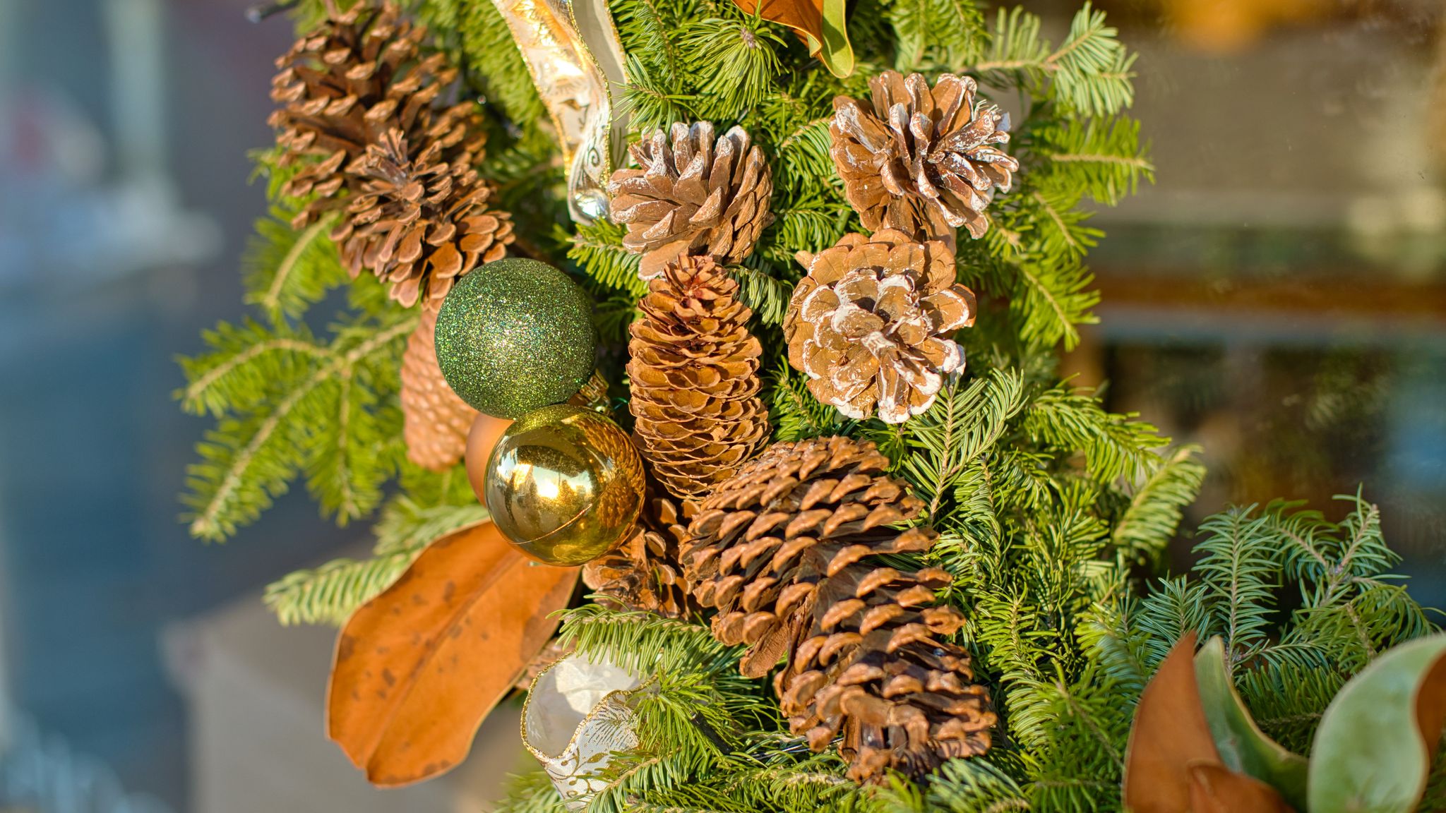 2048x1152 Wallpaper cones, balls, branches, needles, new year, christmas