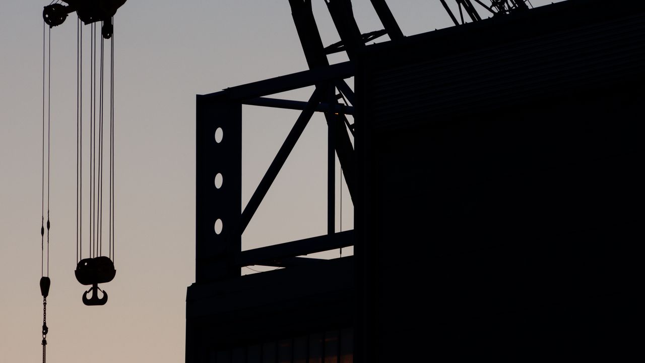 Wallpaper construction crane, building, silhouettes, dark