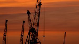 Preview wallpaper construction cranes, sunset, silhouettes