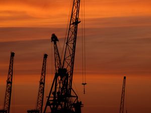 Preview wallpaper construction cranes, sunset, silhouettes