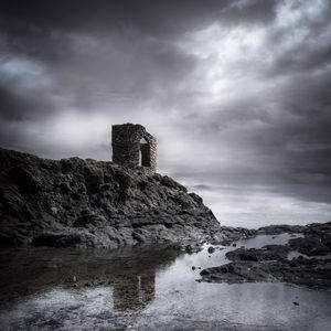 Preview wallpaper construction, rocks, water, sky
