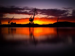 Preview wallpaper construction, water, sunset, reflection