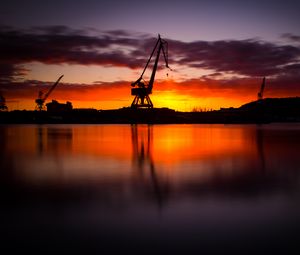 Preview wallpaper construction, water, sunset, reflection