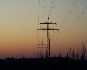 Preview wallpaper constructions, wires, grass, dusk