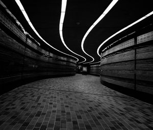 Preview wallpaper corridor, dark, bw, winding, lighting