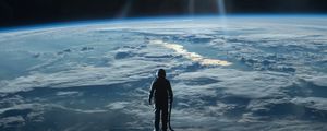 Preview wallpaper cosmonaut, space, planet, atmosphere, surface, glow