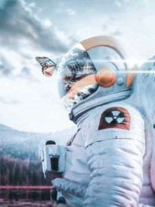 Preview wallpaper cosmonaut, spacesuit, butterfly, reflection, landscape, radioactive