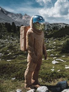 Preview wallpaper cosmonaut, spacesuit, sculpture, wooden