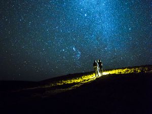 Preview wallpaper couple, hill, sky, stars, night, dark