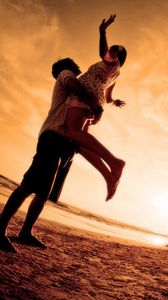 Preview wallpaper couple, hugging, joy, silhouettes, evening