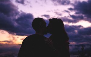 Preview wallpaper couple, kiss, love, sunset, dark