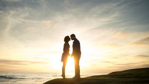 Preview wallpaper couple, love, romance, sunset, sea, shore