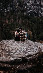 Preview wallpaper couple, rocks, mountains, top, love