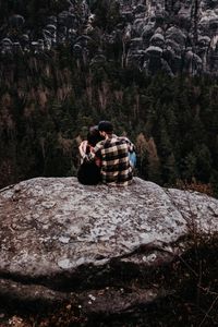 Preview wallpaper couple, rocks, mountains, top, love