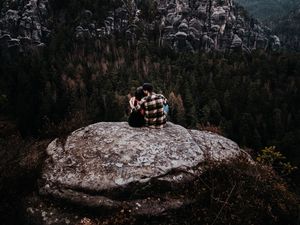 Preview wallpaper couple, rocks, mountains, top, love