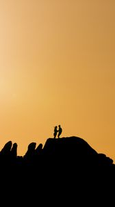 Preview wallpaper couple, silhouettes, hills, evening