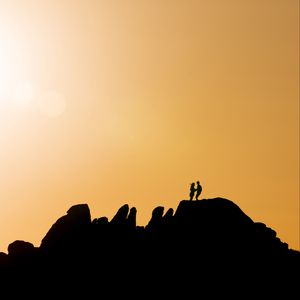 Preview wallpaper couple, silhouettes, hills, evening