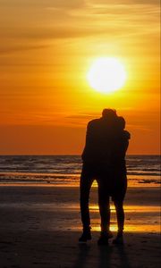 Preview wallpaper couple, silhouettes, hugs, beach, sunset, dark