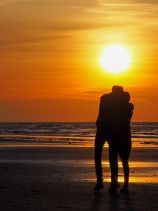 Preview wallpaper couple, silhouettes, hugs, beach, sunset, dark