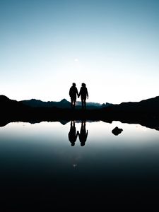 Preview wallpaper couple, silhouettes, reflection, sunset
