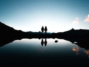 Preview wallpaper couple, silhouettes, reflection, sunset