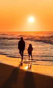 Preview wallpaper couple, silhouettes, sea, sunset, walk