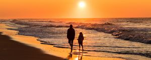 Preview wallpaper couple, silhouettes, sea, sunset, walk