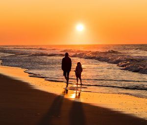 Preview wallpaper couple, silhouettes, sea, sunset, walk