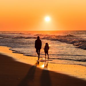 Preview wallpaper couple, silhouettes, sea, sunset, walk