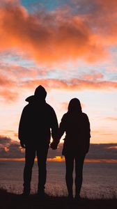 Preview wallpaper couple, silhouettes, sunset, sky