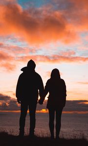 Preview wallpaper couple, silhouettes, sunset, sky