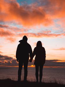 Preview wallpaper couple, silhouettes, sunset, sky