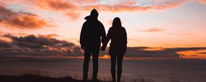 Preview wallpaper couple, silhouettes, sunset, sky