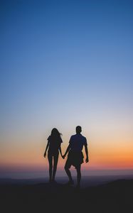 Preview wallpaper couple, silhouettes, sunset, love, horizon