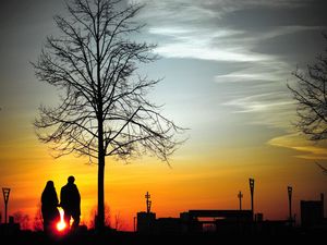 Preview wallpaper couple, silhouettes, sunset, walk, tree
