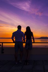 Preview wallpaper couple, sunset, sea, sky