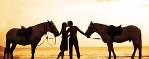 Preview wallpaper couple, sunset, sea, tenderness, horses, romance