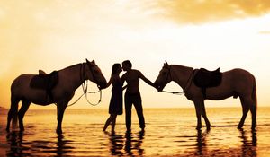 Preview wallpaper couple, sunset, sea, tenderness, horses, romance