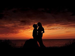 Preview wallpaper couple, sunset, silhouette, arms, stone