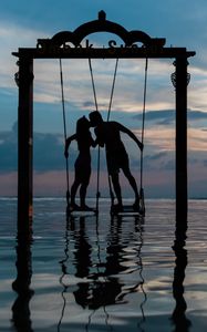 Preview wallpaper couple, swing, sea, romance, sunset, silhouettes