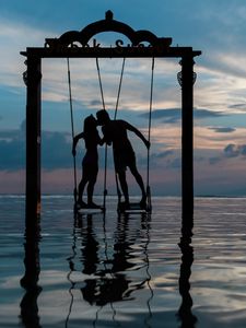 Preview wallpaper couple, swing, sea, romance, sunset, silhouettes