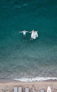 Preview wallpaper couple, water, aerial view, romance, love