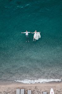 Preview wallpaper couple, water, aerial view, romance, love