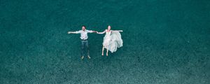 Preview wallpaper couple, water, aerial view, romance, love